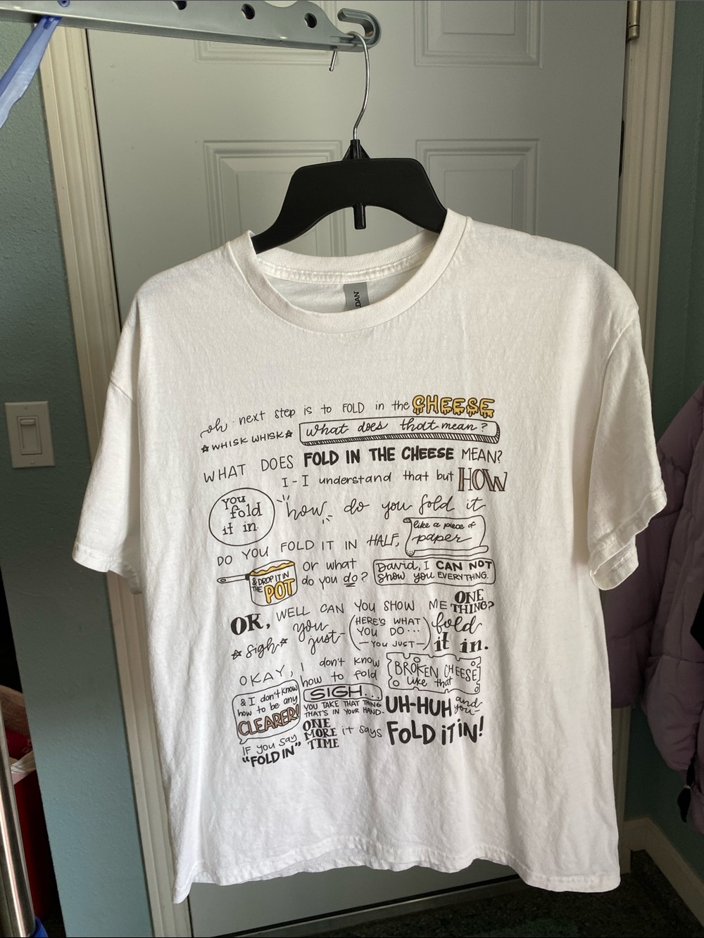 White Short-Sleeve Crewneck Tee with Black Script and Yellow Accent